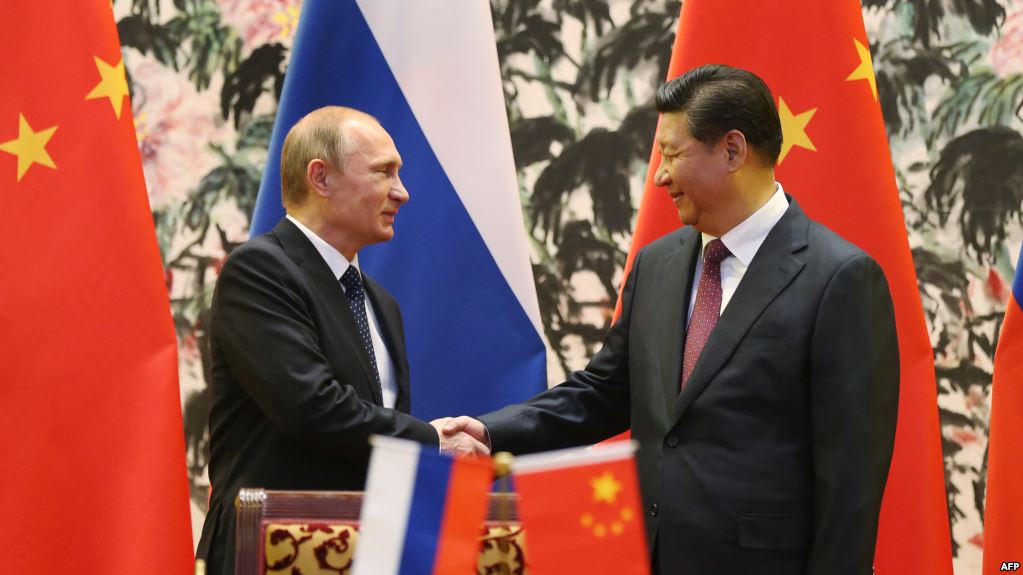 Tramp Rusiya-Çin blokunu dağıda biləcəkmi?