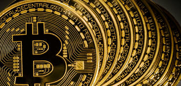 "Bitcoin"in qiyməti 77 min dolları ötüb