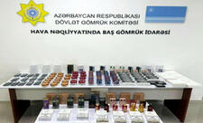 Sərnişinlərə paylanılaraq gömrükdən qanunsuz keçirilməsinə cəhd edilən mallar tutulub