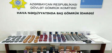 Sərnişinlərə paylanılaraq gömrükdən qanunsuz keçirilməsinə cəhd edilən mallar tutulub