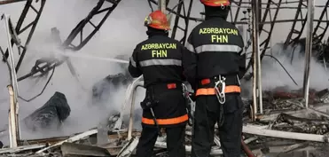 Abşeronda yaşayış binalarına yaxın ərazidə yanğın baş verib