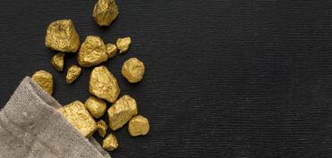 Əmtəə bazarlarında qızıl 5 min dollardan yuxarı səviyyədə ticarət olunur