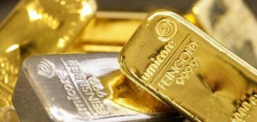 Əmtəə bazarlarında qızıl 5 200 dollardan aşağı səviyyədə ticarət olunur