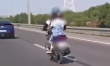 Bakıda övladını təhlükəli şəkildə daşıyan motosiklet sürücüsü saxlanılıb