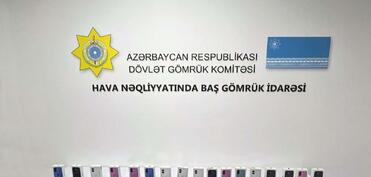 İstanbuldan Bakıya gələn çamadanda bəyan edilməyən 17 telefon aşkarlanıb