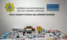 Aeroportda sərnişinlərin baqajından gömrükdən gizlədilən dərmanlar və siqaretlər aşkarlanıb